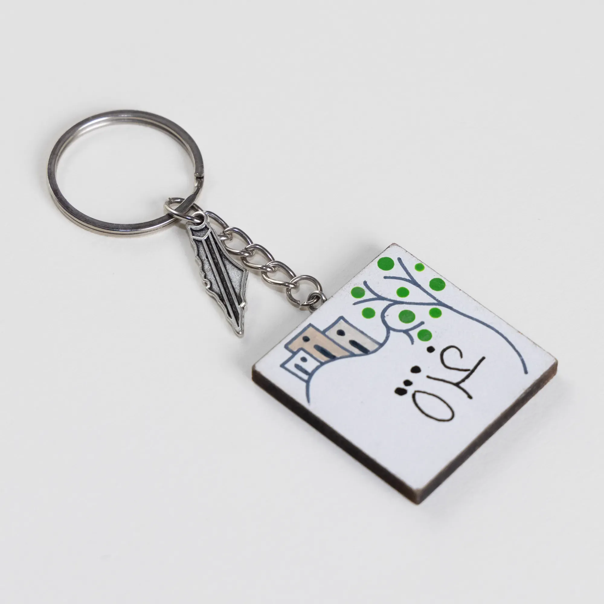 Personalized Wooden Arabic Name Keychain with Green Dot Skyline - 4 x 4 cm