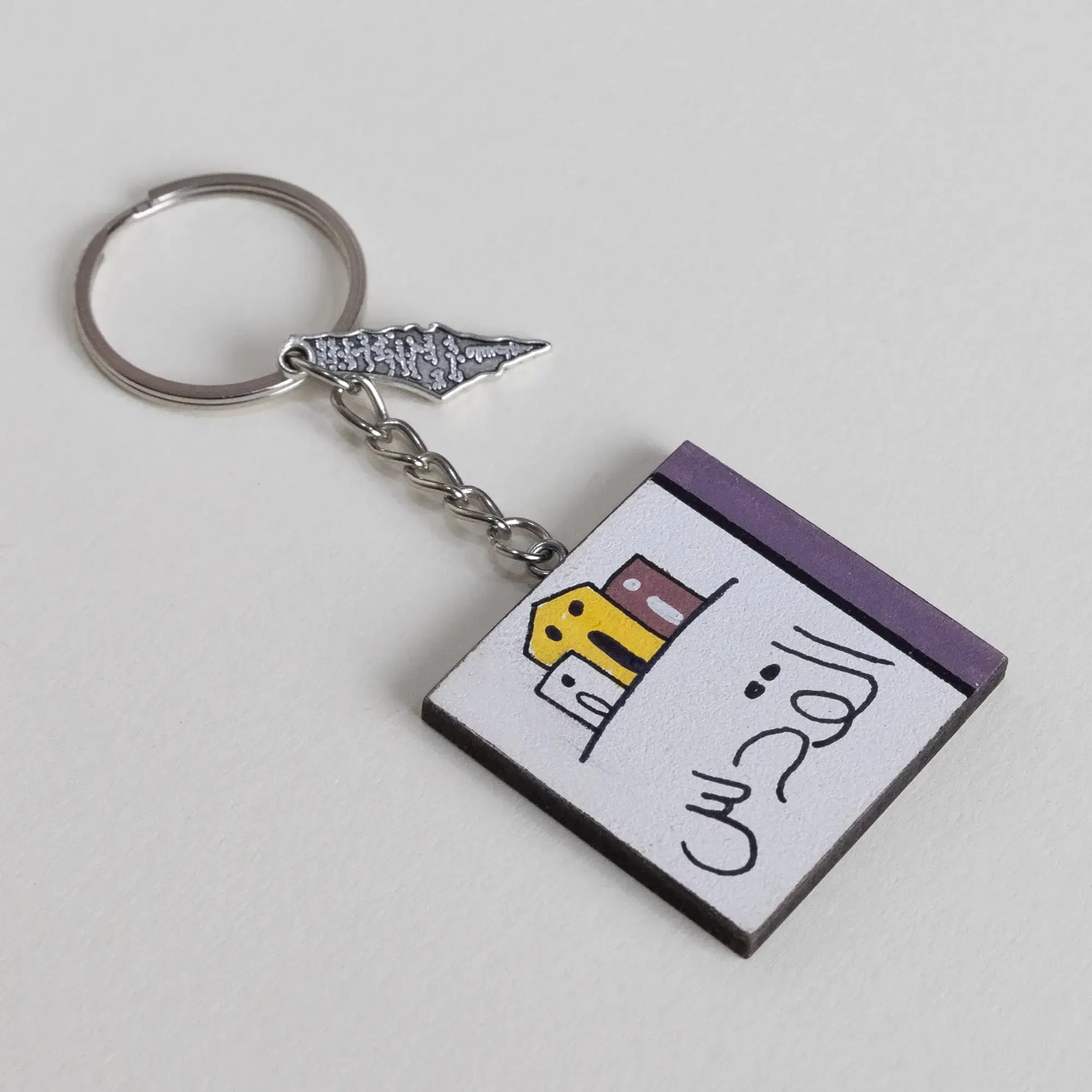 Personalized Wooden Arabic Name Keychain with Purple Side Stripe - 4 x 4 cm
