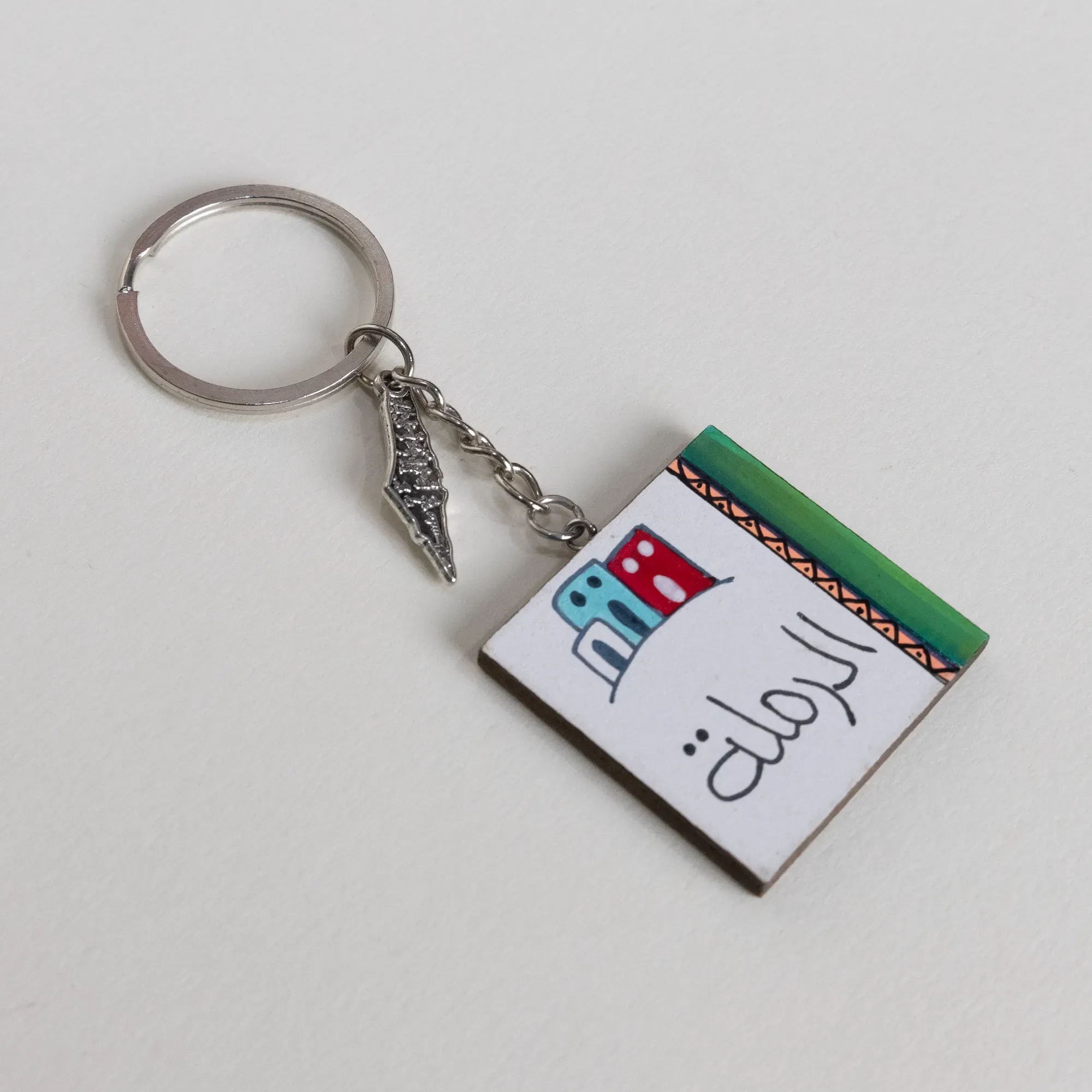 Personalized Wooden Arabic Name Keychain with Pastel Window Stripe - 4 x 4 cm