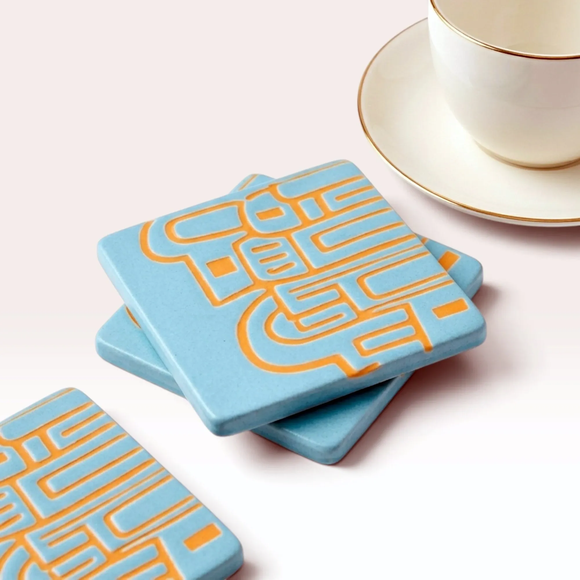 Square Turquoise Ceramic Coaster with Heritage Carving