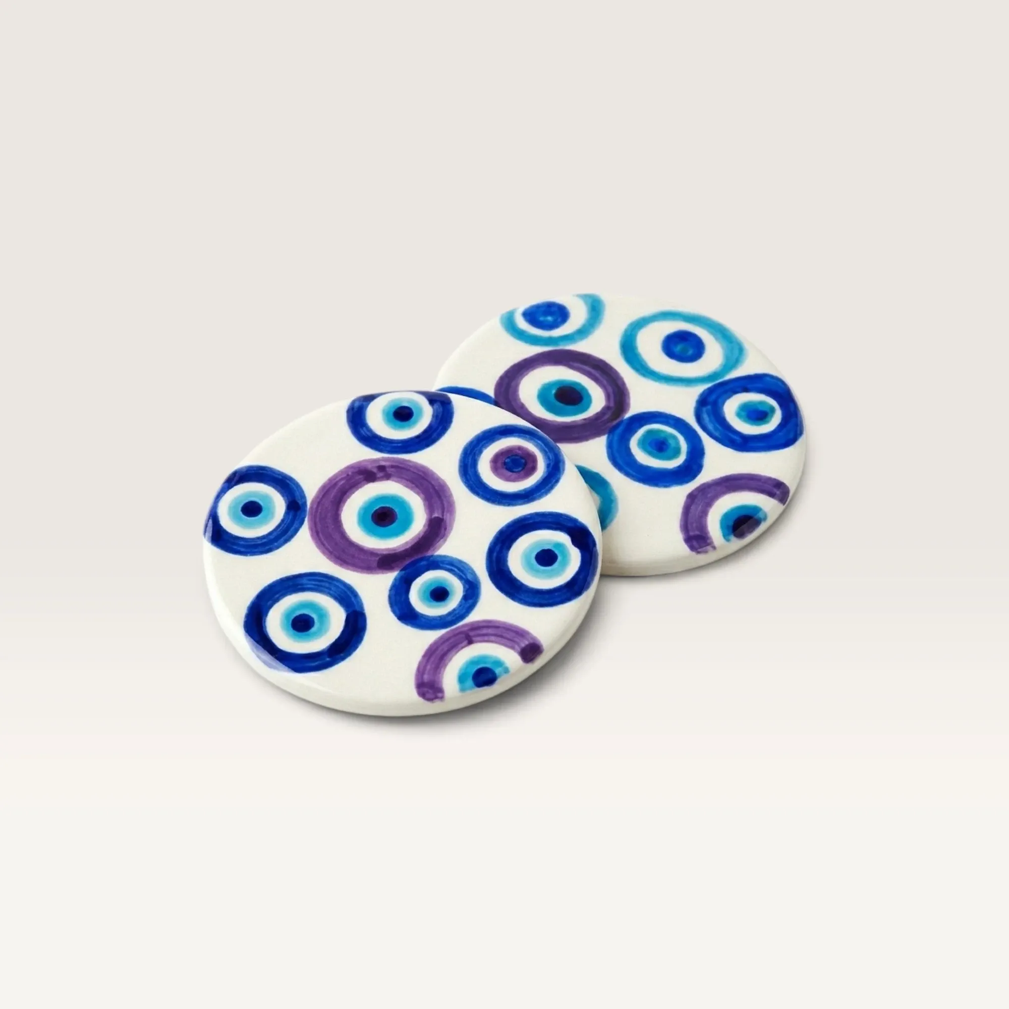 Sky and Sea Round Handmade Ceramic Coaster with Blue Motifs