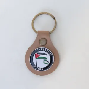 ميدالية جلد طبيعي للمفاتيح بتصميم شعار فلسطين أكشن الدائري