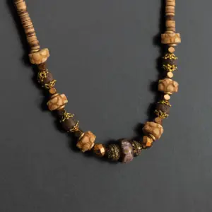 Handcrafted Bohemian Necklace in bone beads with Distinctive Detail