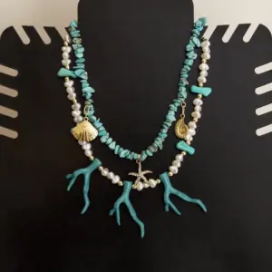 Contemporary Necklace in turquoise, faux pearl with coastal detail