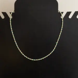 Handcrafted Contemporary Necklace in turquoise with Distinctive Detail