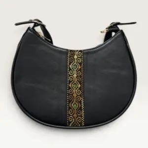 Black Half-Moon Shoulder Bag with narrow gold and green geometric band, 25 x 17 cm